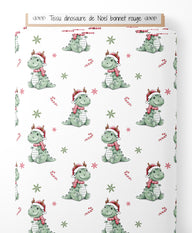 Tissu - dinosaure de Noel bonnet rouge