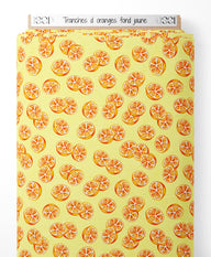 Tissu - Tranches d'oranges sur fond jaune