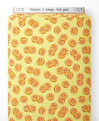 Tissu - Tranches d'oranges sur fond jaune