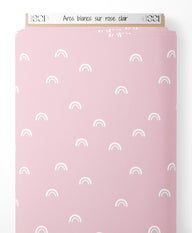 Tissu - Arcs blancs sur rose clair