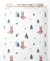 Tissu - Lapin traîneau et sapins