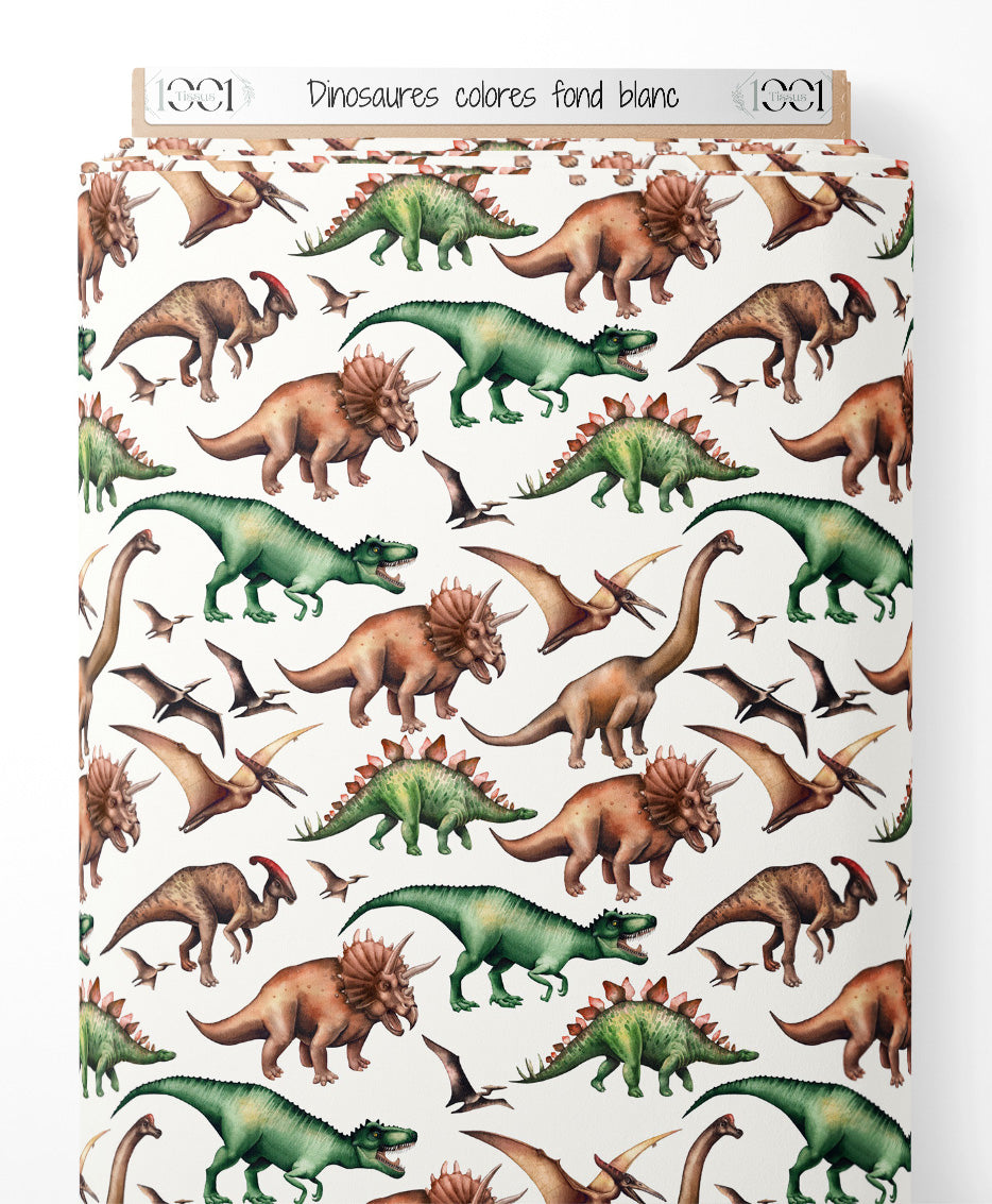 Tissu - Dinosaures colorés sur fond blanc