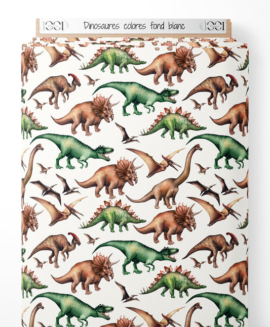 Tissu - Dinosaures colorés sur fond blanc
