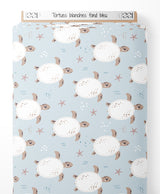 Tissu - Tortues blanches sur fond bleu