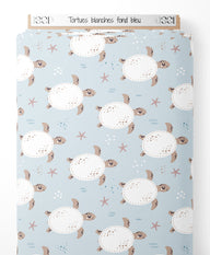Tissu - Tortues blanches sur fond bleu