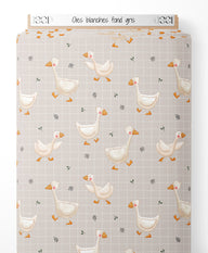 Tissu - Oies blanches sur fond gris