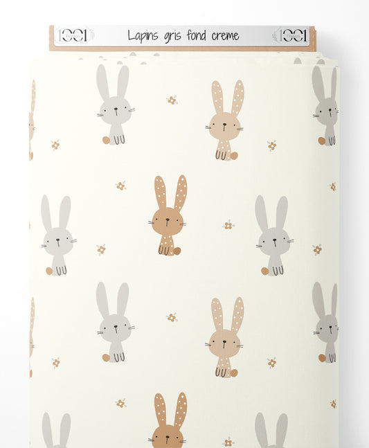 Tissu - Lapins gris sur fond crème