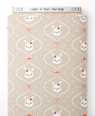 Tissu - Lapins et fleurs sur fond beige