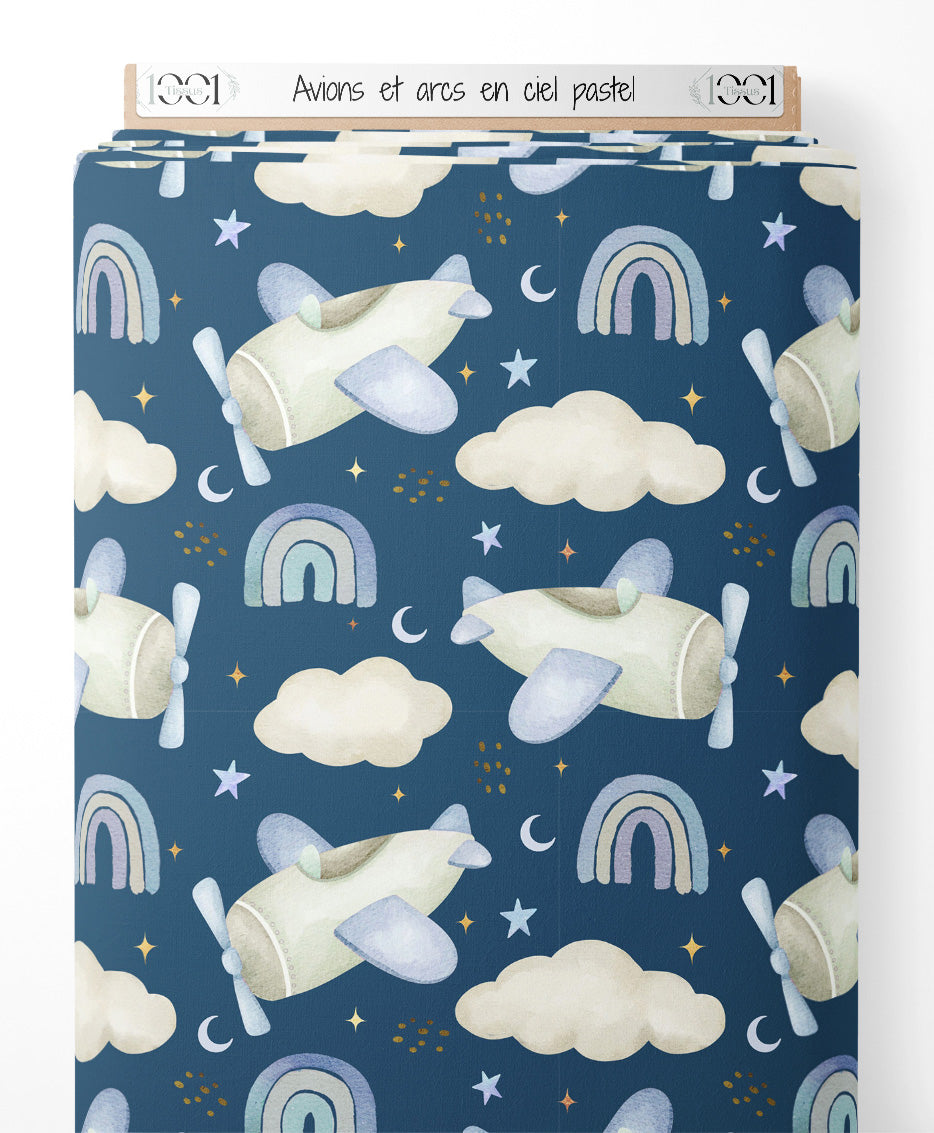 Tissu - Avions et arcs-en-ciel pastel