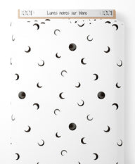 Tissu - Lunes noires sur blanc