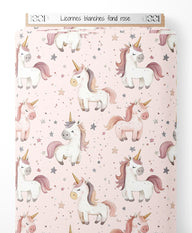 Tissu - Licornes blanches sur fond rose