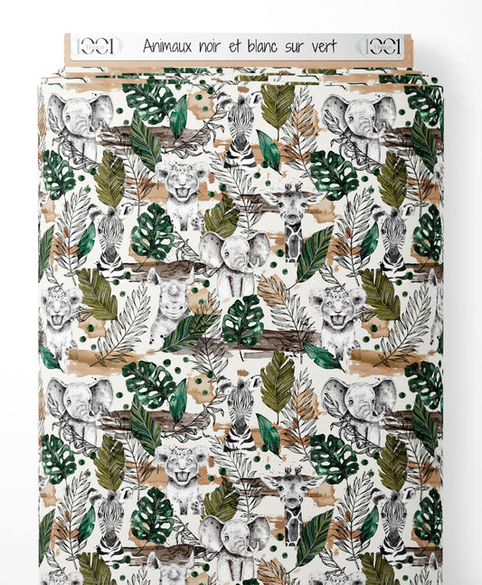 Tissu - Animaux noir et blanc sur vert