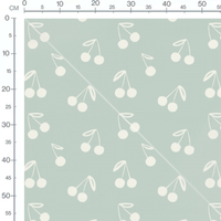 Tissu - Cerises blanches sur vert
