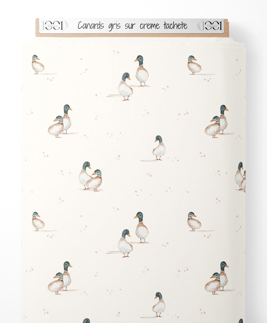 Tissu - Canards gris sur crème tacheté