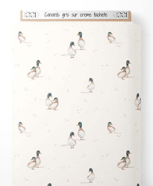 Tissu - Canards gris sur crème tacheté