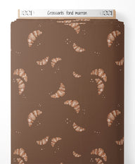 Tissu - Croissants sur fond marron