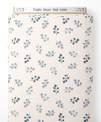 Tissu - Feuilles bleues sur fond crème