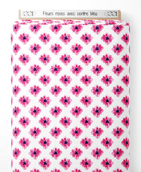 Tissu - Fleurs roses avec centre bleu