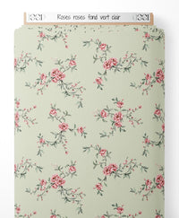 Tissu - Roses roses sur fond vert clair