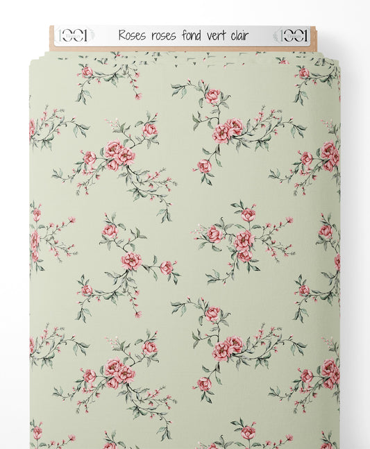 Tissu - Roses roses sur fond vert clair