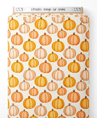 Tissu - Citrouilles orange sur crème