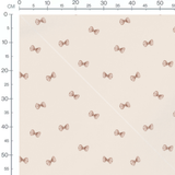 Tissu - Nœuds papillon marron sur beige