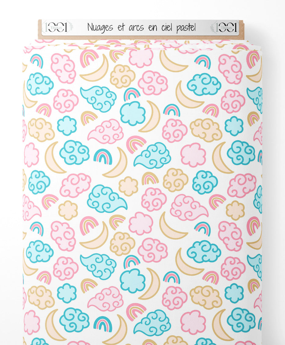 Tissu - Nuages et arcs-en-ciel pastel