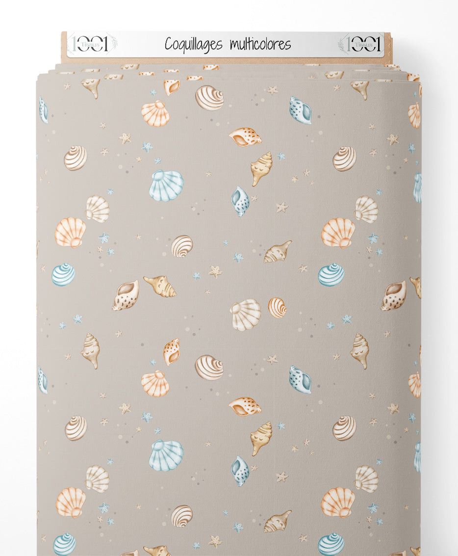 Tissu - Coquillages multicolores sur fond