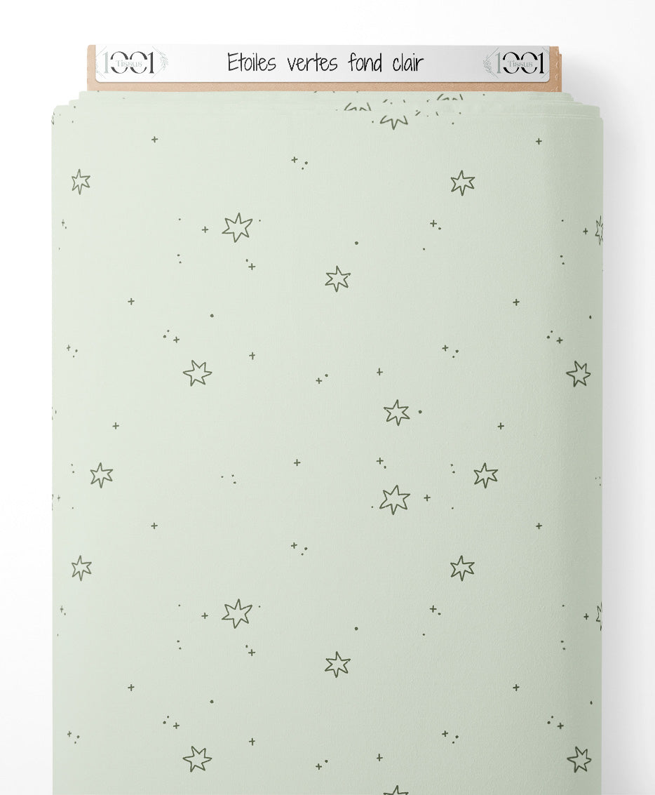 Tissu - Étoiles vertes sur fond clair