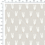Tissu - Lapins blancs sur fond beige