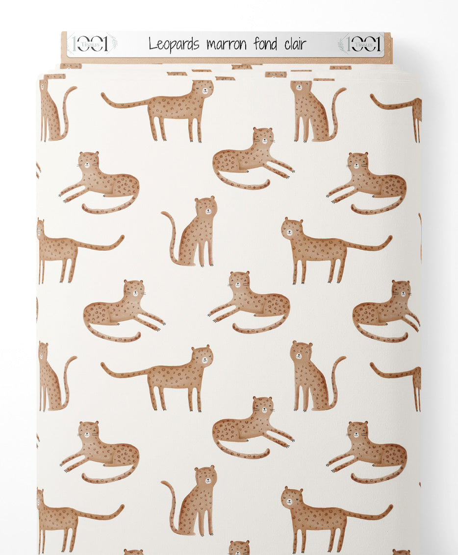 Tissu - Léopards marron sur fond clair