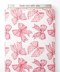Tissu - Nœuds roses motifs variés