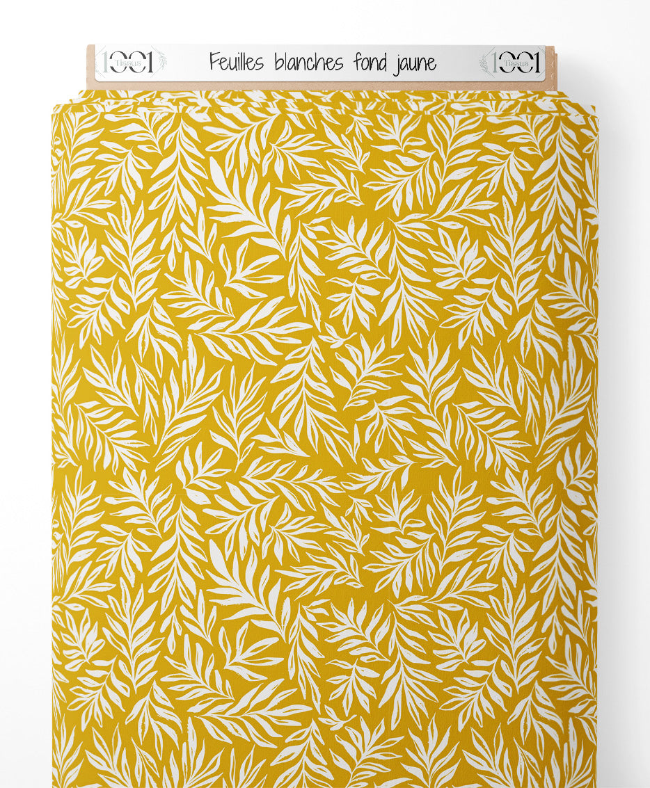 Tissu - Feuilles blanches sur fond jaune