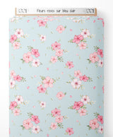 Tissu - Fleurs roses sur bleu clair