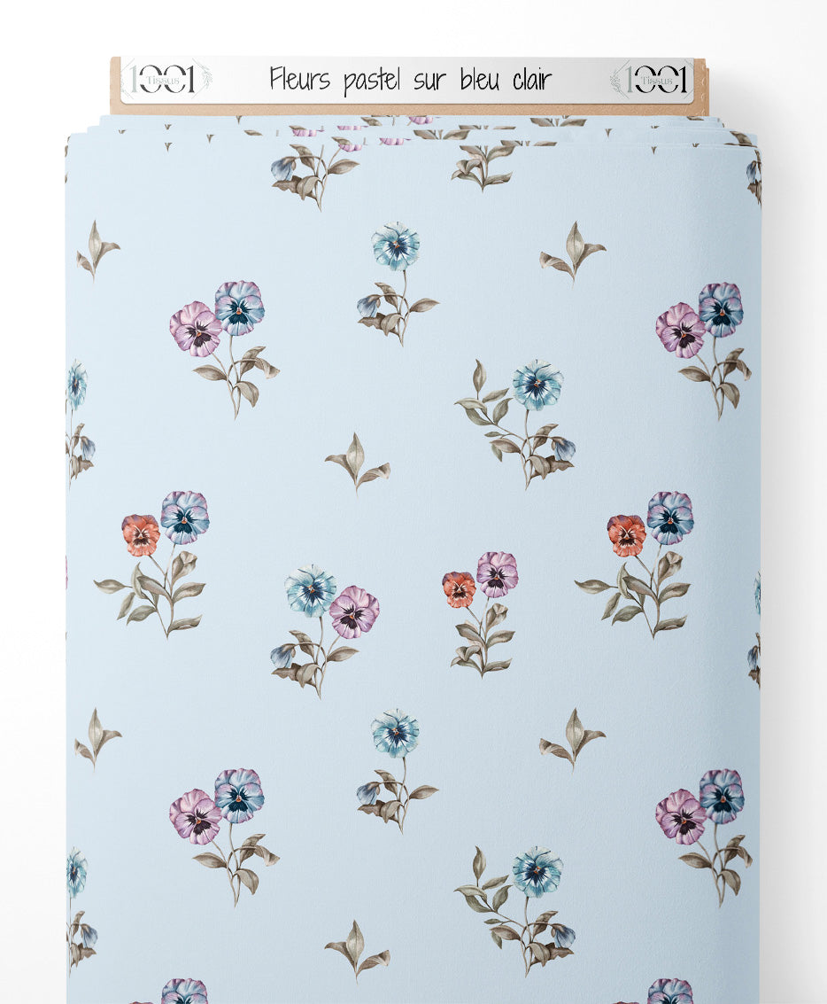 Tissu - Fleurs pastel sur bleu clair