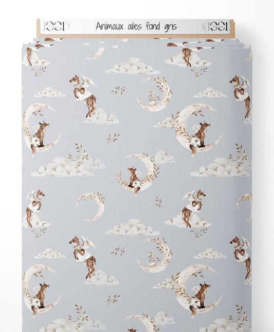 Tissu - Animaux ailés sur fond gris
