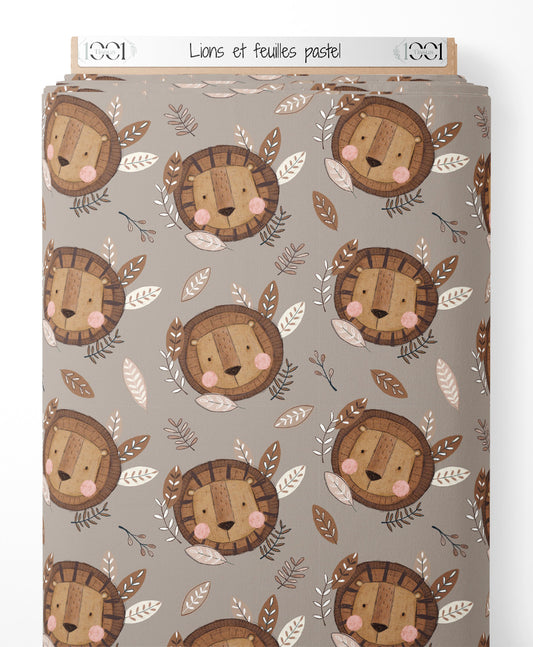 Tissu - Lions et feuilles pastel