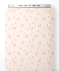 Tissu - Fleurs roses sur crème doux