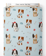 Tissu - Chiens marron sur fond bleu