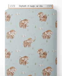 Tissu - Éléphants et nuages sur bleu