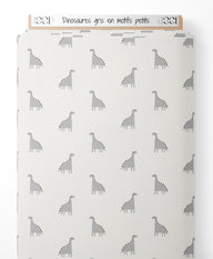 Tissu - Dinosaures gris en motifs petits