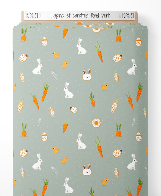 Tissu - Lapins et carottes sur fond vert