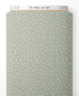 Tissu - Pois blancs sur vert