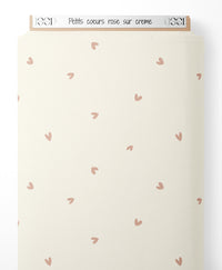 Tissu - Petits cœurs rose sur crème