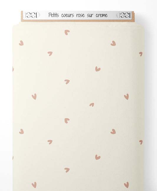 Tissu - Petits cœurs rose sur crème