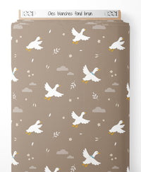 Tissu - Oies blanches sur fond brun