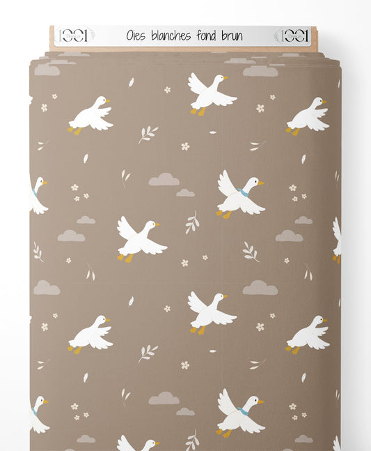 Tissu - Oies blanches sur fond brun