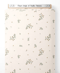 Tissu - Fleurs beige et feuilles foncées