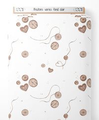 Tissu - Boutons variés sur fond clair