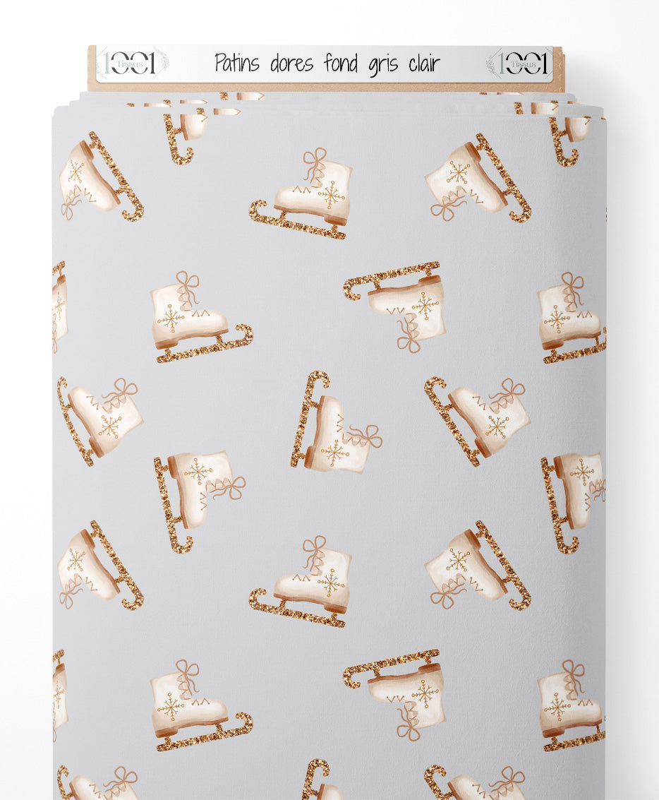 Tissu - Patins dorés sur fond gris clair